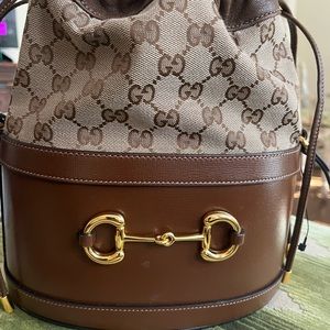 Gucci Drawstring Bucket Bag NWT Brown leather monogram Horsebit Buckle.